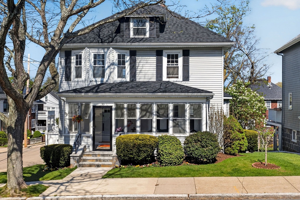 33 Bateswell Road Boston, MA 02124 - Photo 2 of 38 a front view of a house with garden