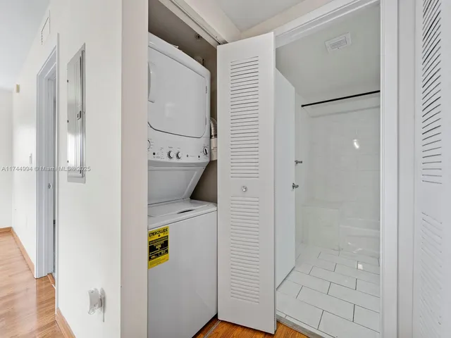 a bathroom with a sink and a shower