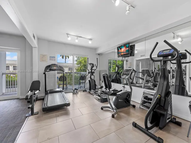 a view of a room with gym equipment