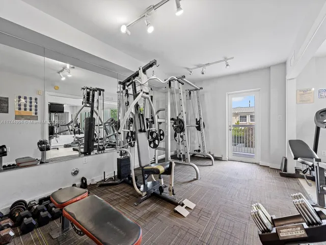 a view of a room with gym equipment