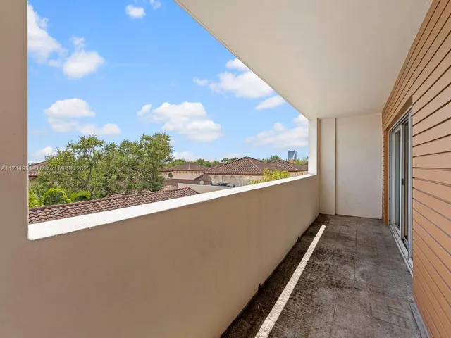 a view of an outdoor space with a large window