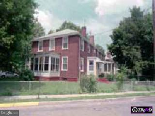 1105 Collings Road Camden, NJ 08104 - Photo 1 of 1 a front view of a house with a yard