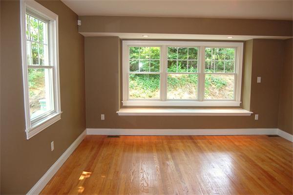 17 Willowdale Road Winchester, MA 01890 - Photo 13 of 24 a view of an empty room with wooden floor and a window