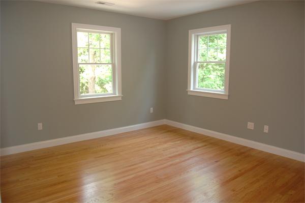 17 Willowdale Road Winchester, MA 01890 - Photo 15 of 24 a view of an empty room with wooden floor and a window