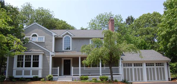 17 Willowdale Road Winchester, MA 01890 - Photo 2 of 24 a front view of a house with a garden