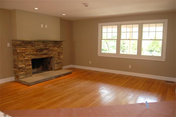 17 Willowdale Road Winchester, MA 01890 - Photo 7 of 24 an empty room with wooden floor fireplace and windows