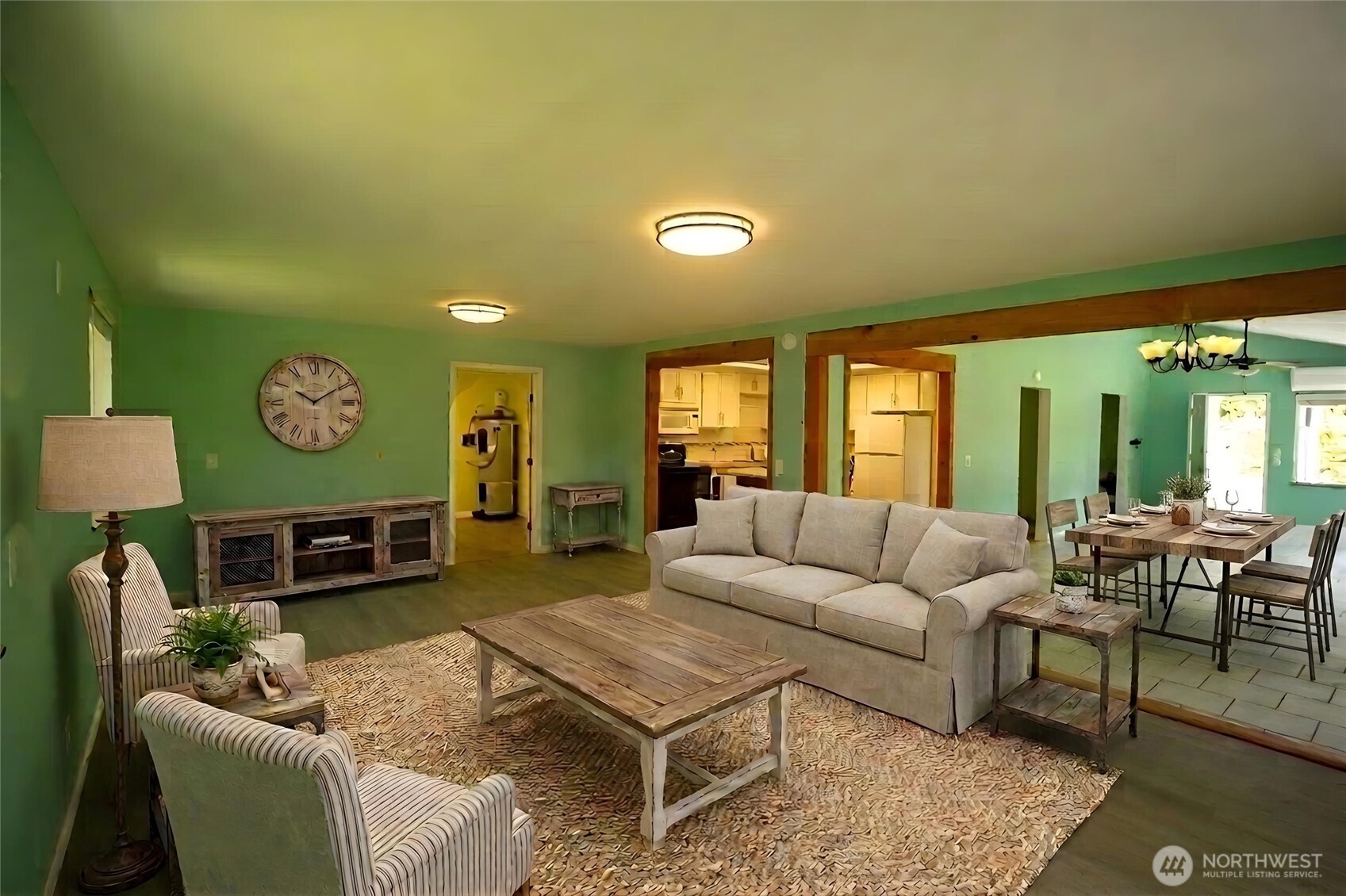 89 Slab Camp Road Sequim, WA 98382 - Photo 8 of 40 a living room with furniture a fireplace and a table
