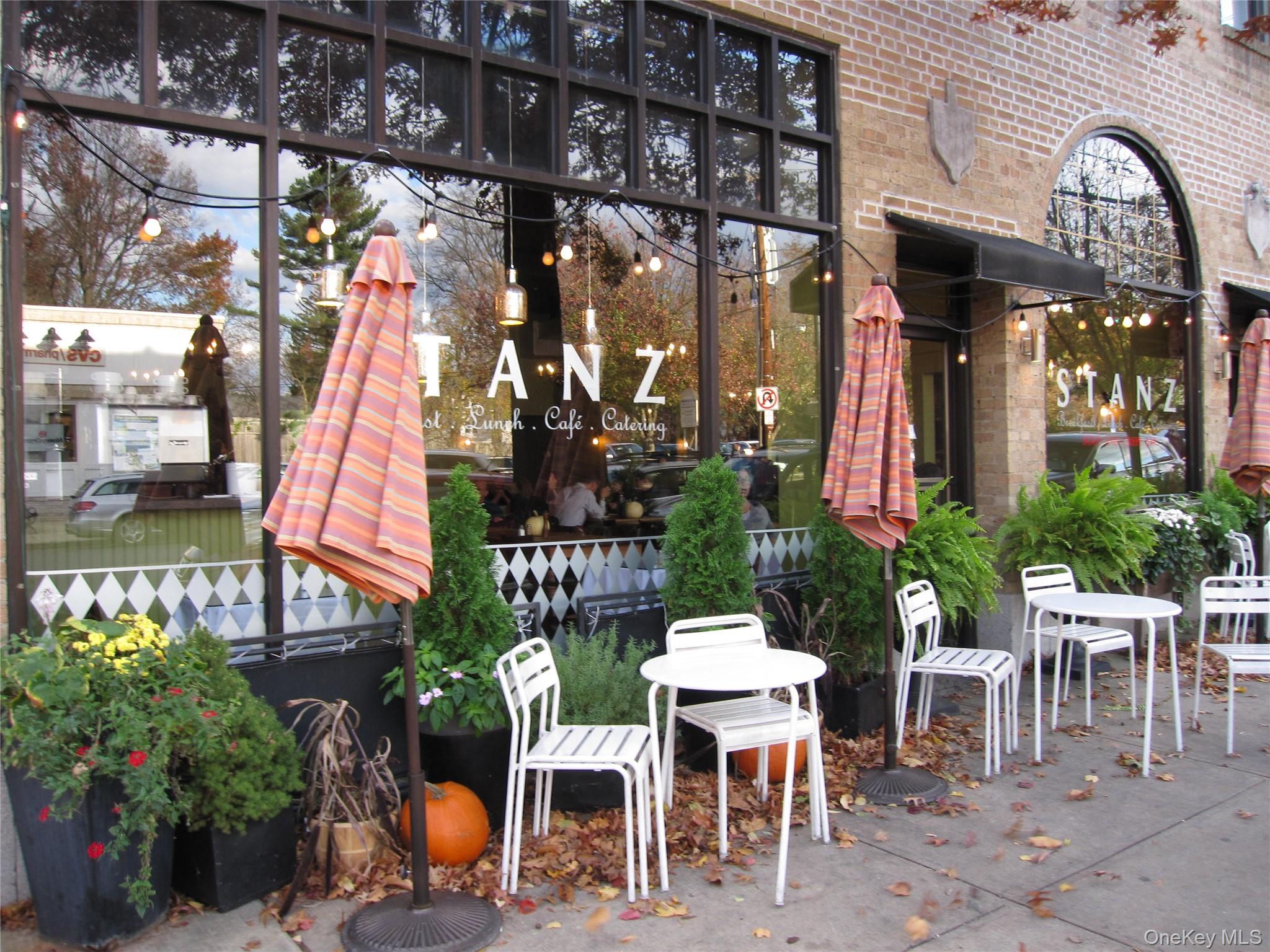 1444 Boston Post Road, Unit 3G Larchmont, NY 10538 - Photo 17 of 18 a view of a chairs and table in a patio