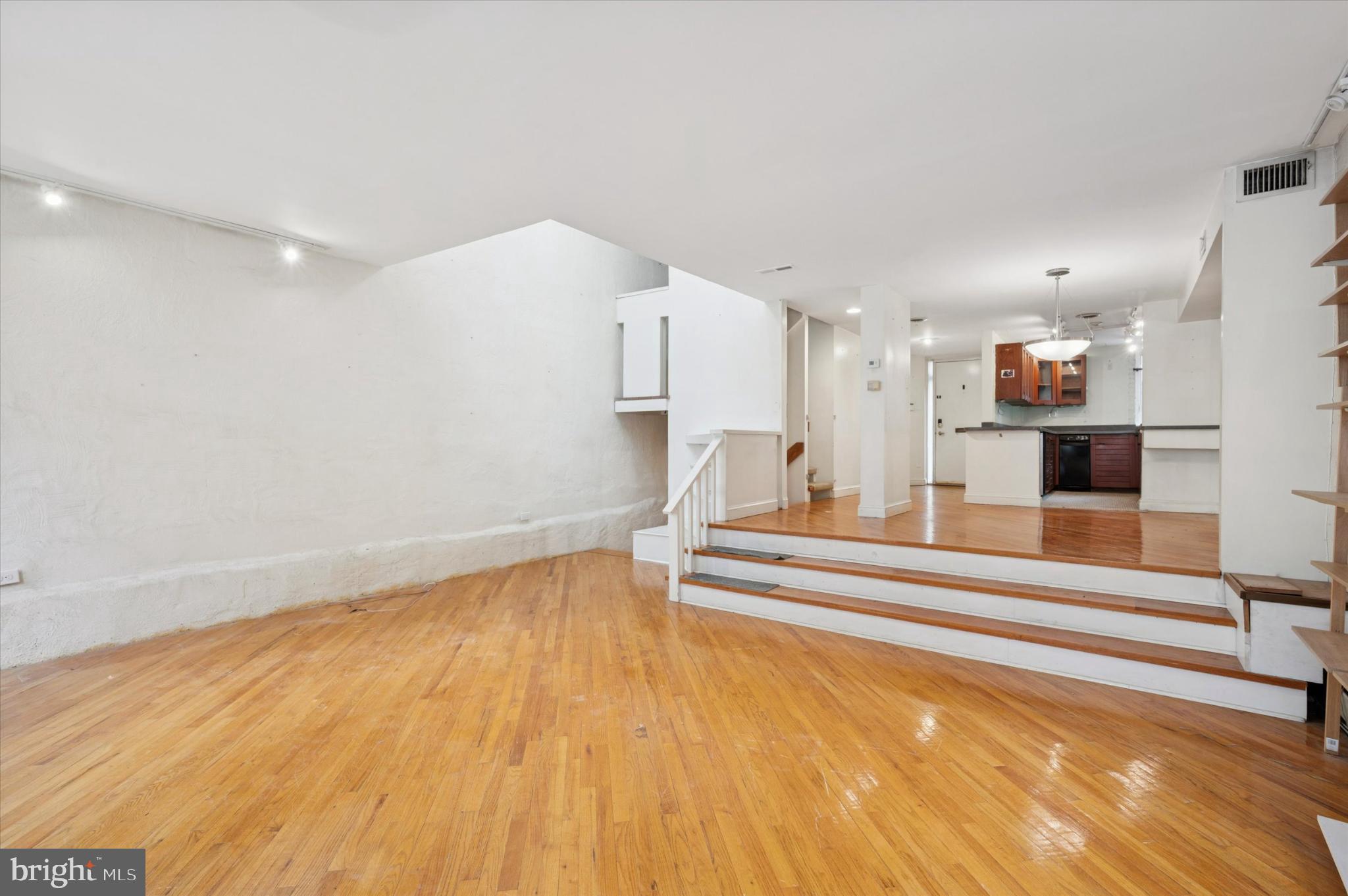 304 Delancey Street Philadelphia, PA 19106 - Photo 12 of 35 Spacious open layout with warm wood floors.