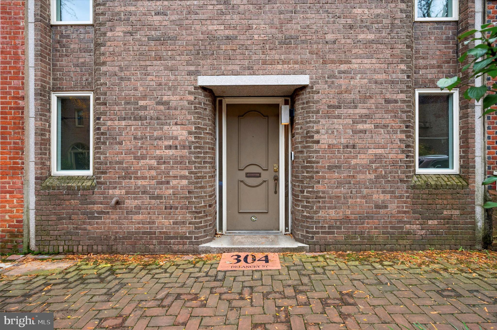 304 Delancey Street Philadelphia, PA 19106 - Photo 2 of 35 Charming brick facade with inviting entrance.