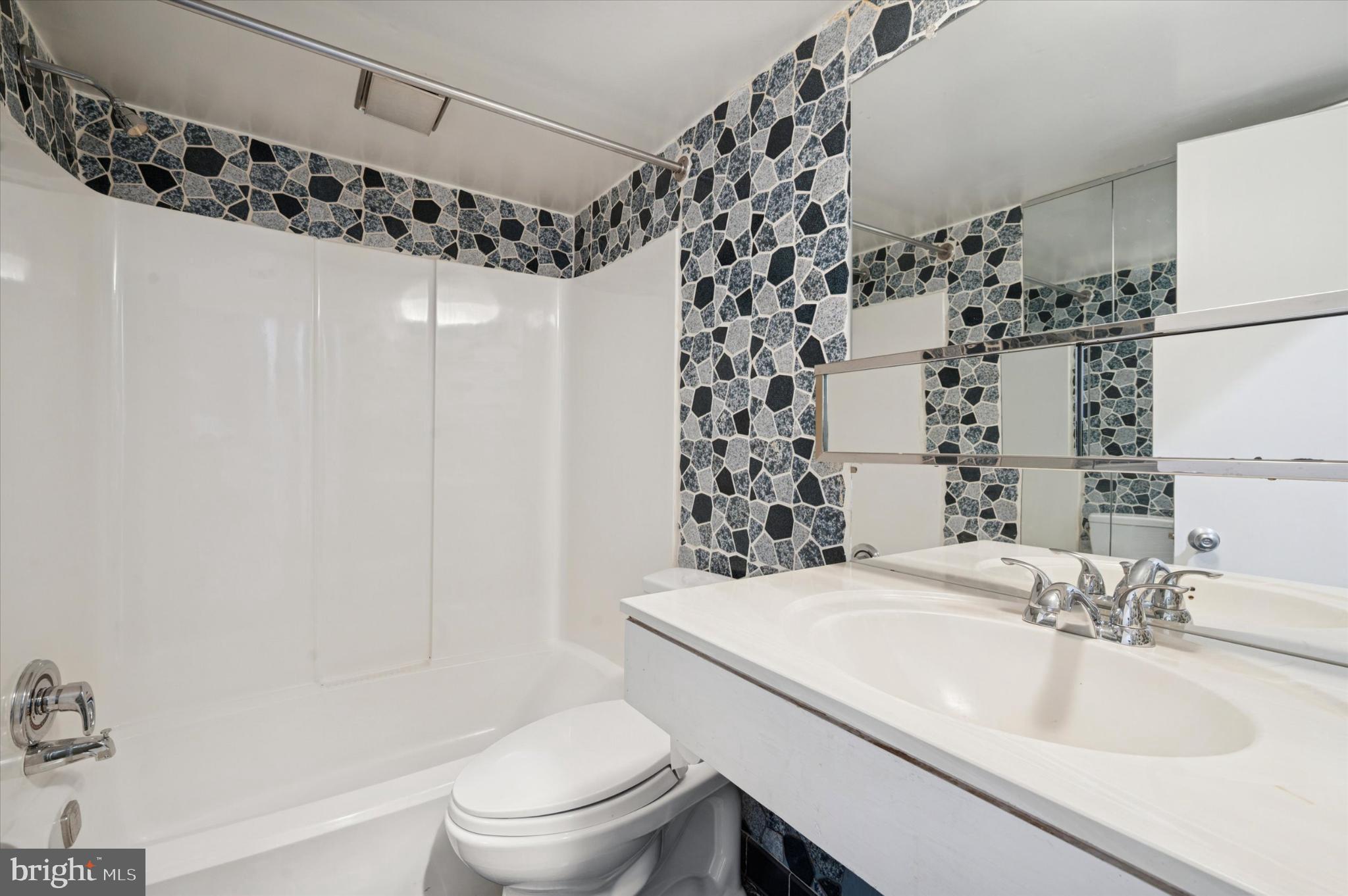 304 Delancey Street Philadelphia, PA 19106 - Photo 22 of 35 Stylish bathroom with modern tile accents.