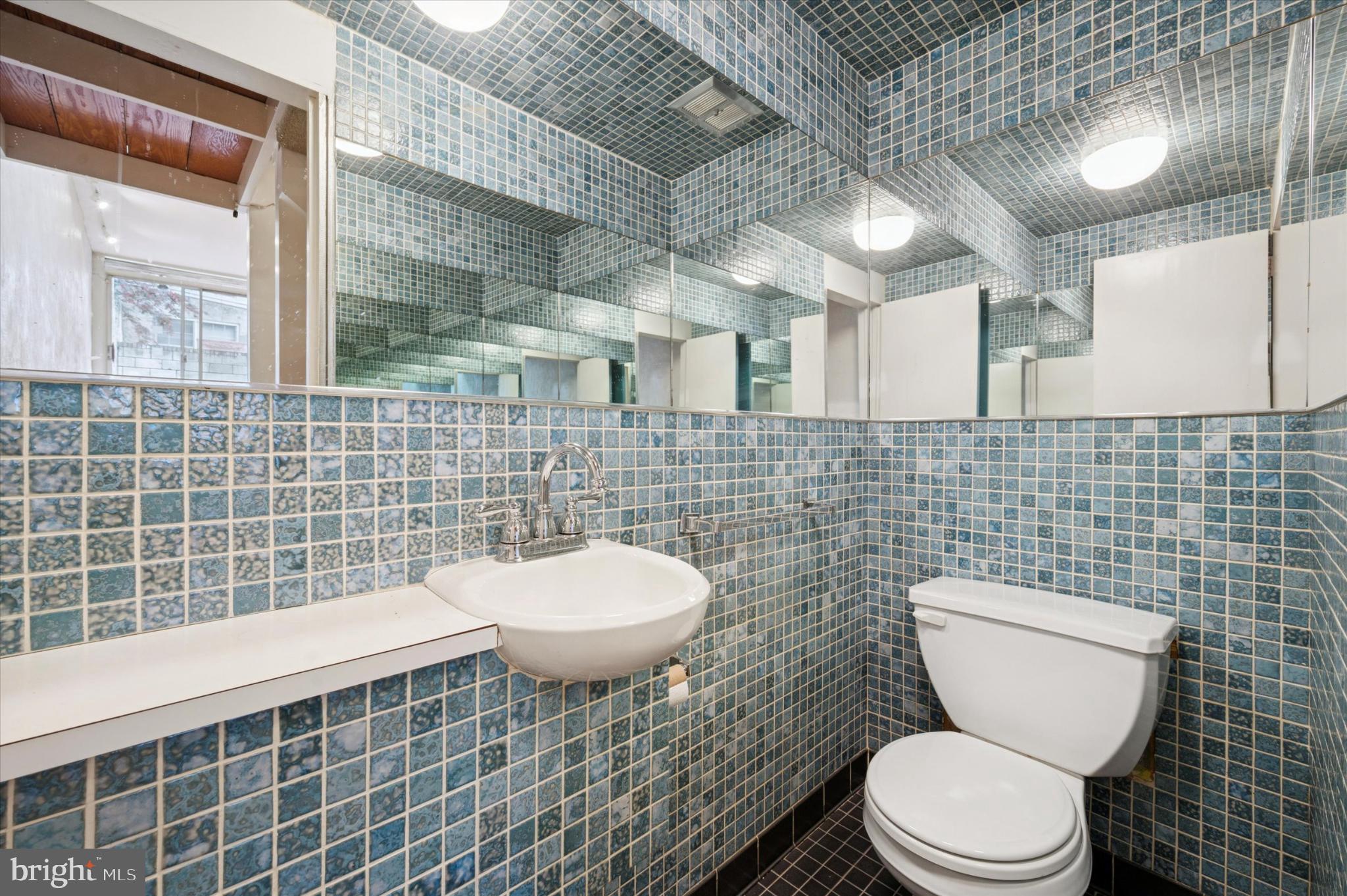 304 Delancey Street Philadelphia, PA 19106 - Photo 34 of 35 Charming tiled bathroom with modern accents.