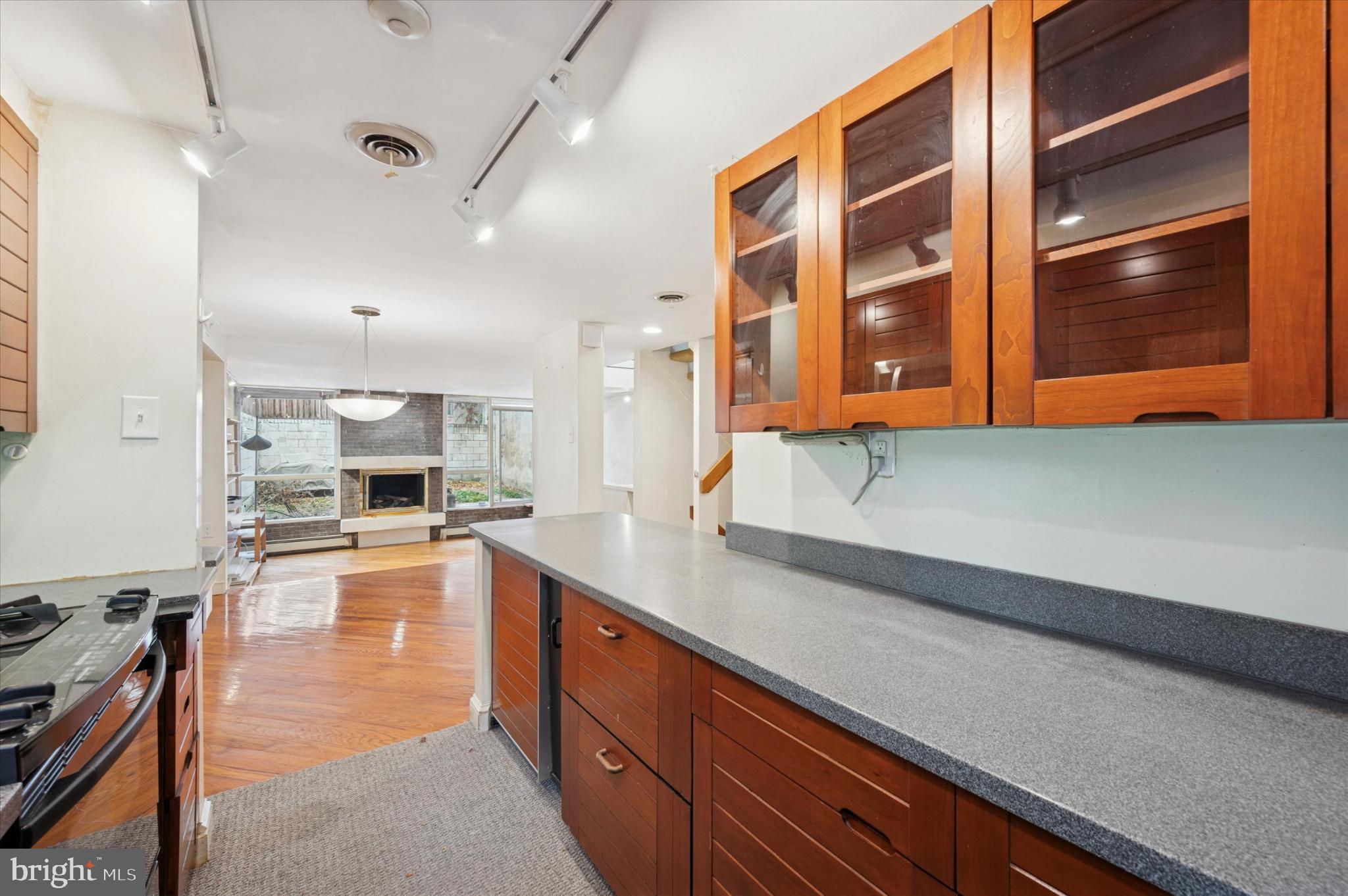 304 Delancey Street Philadelphia, PA 19106 - Photo 10 of 35 Modern kitchen flows into inviting living space.