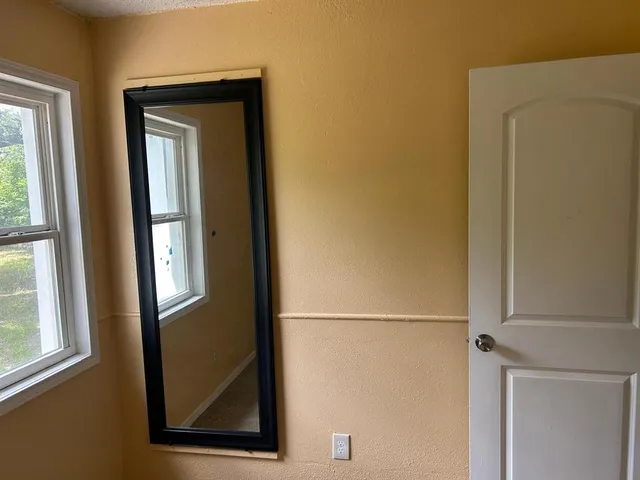 a bathroom with a sink a toilet and bathtub