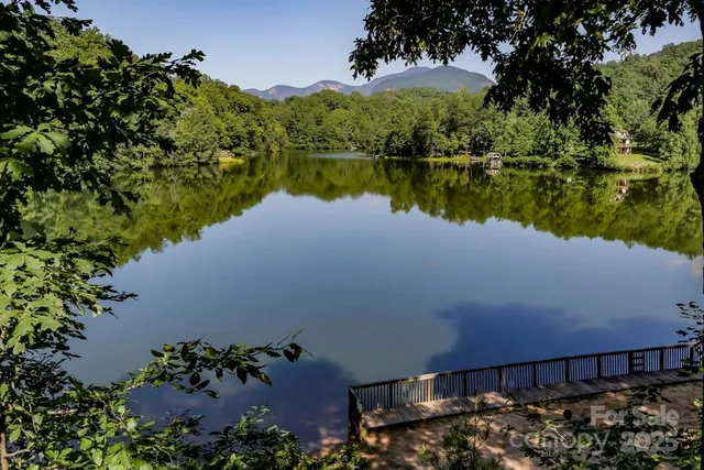 a view of a lake with a lake in the background