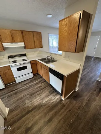 a room with furniture and a flat screen tv