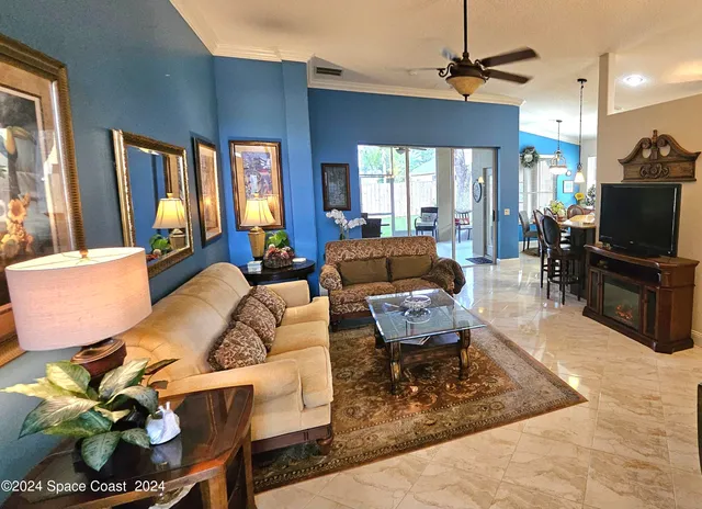a living room with furniture and a couch
