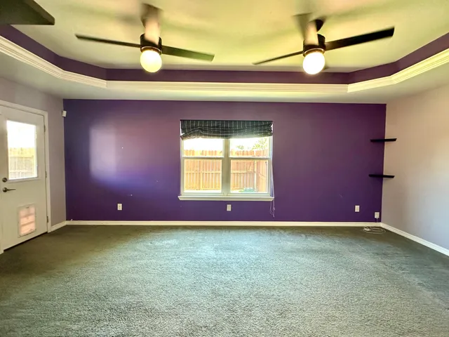 a kitchen with a sink and a refrigerator