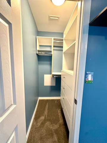 a view of a garage and a kitchen