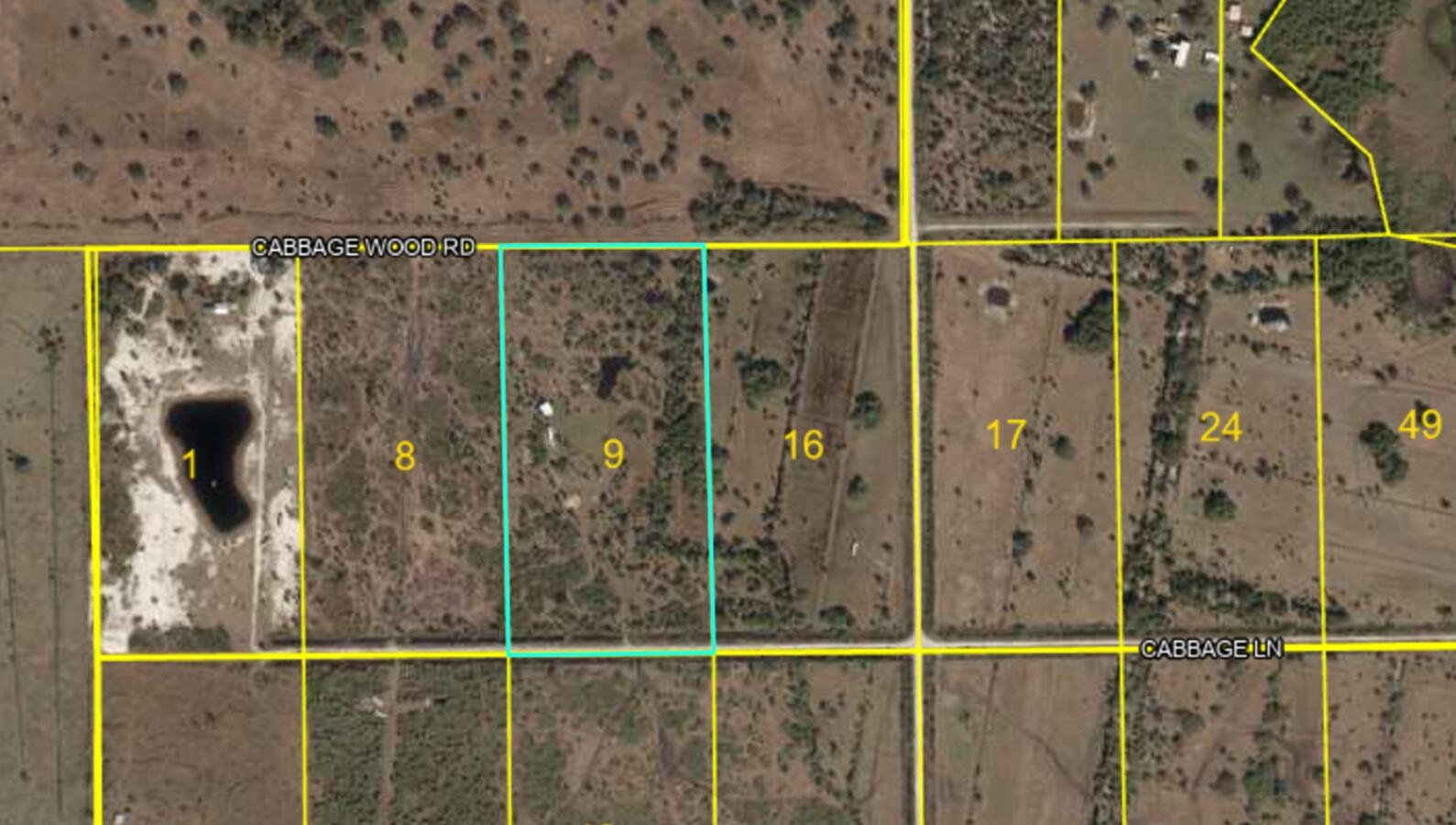 1303 Cabbage Lane Okeechobee, FL 34974 - Photo 14 of 14 a bathroom with a shower