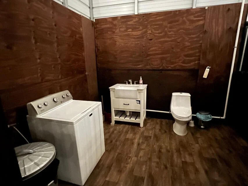 1303 Cabbage Lane Okeechobee, FL 34974 - Photo 5 of 14 a utility room with dryer and washer