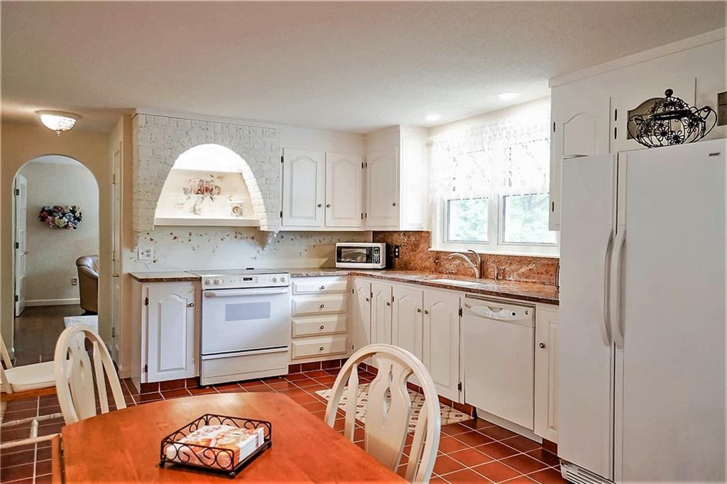 255 Methodist Road Westbrook, ME 04092 - Photo 13 of 34 A cozy eating nook fits right in the...