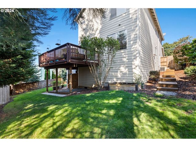 a view of a house with a yard porch and sitting area