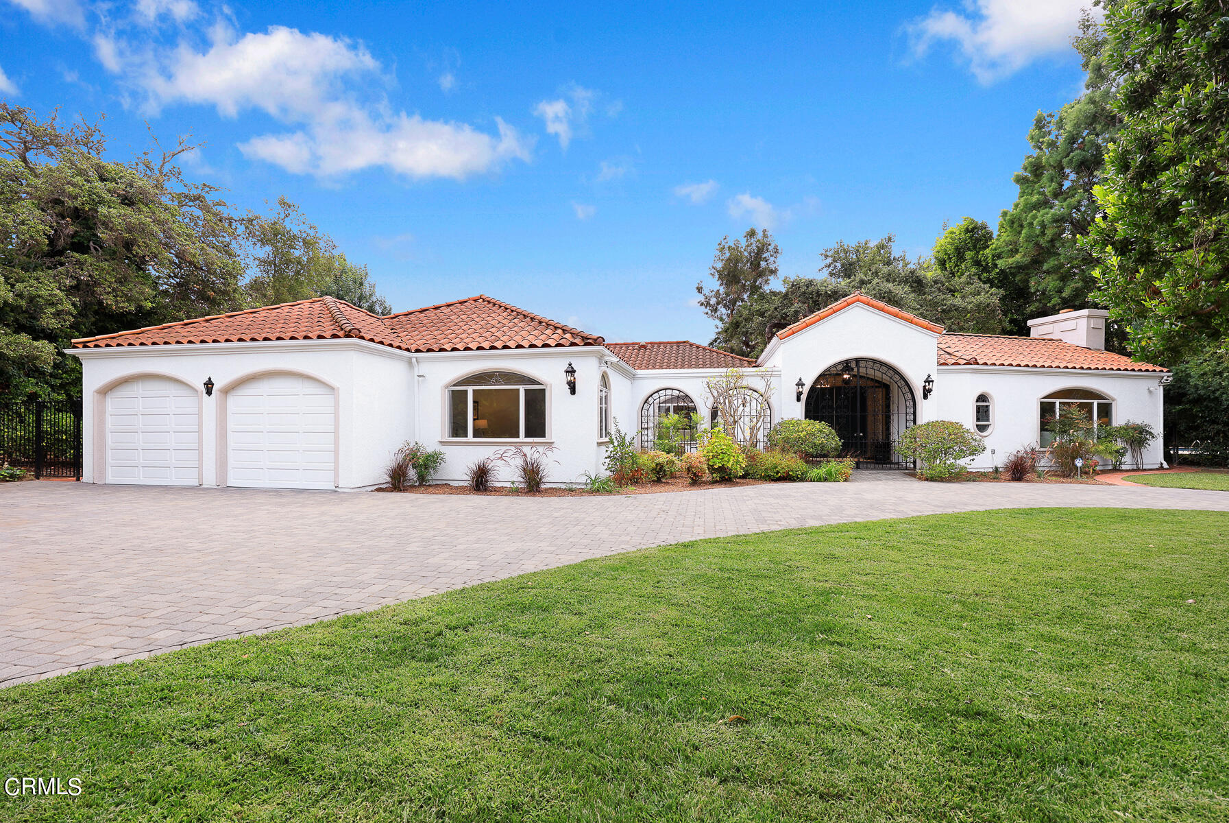 2065 Ashbourne Drive South Pasadena, CA 91030 - Photo 17 of 17 a large white house with a white fence in front of it