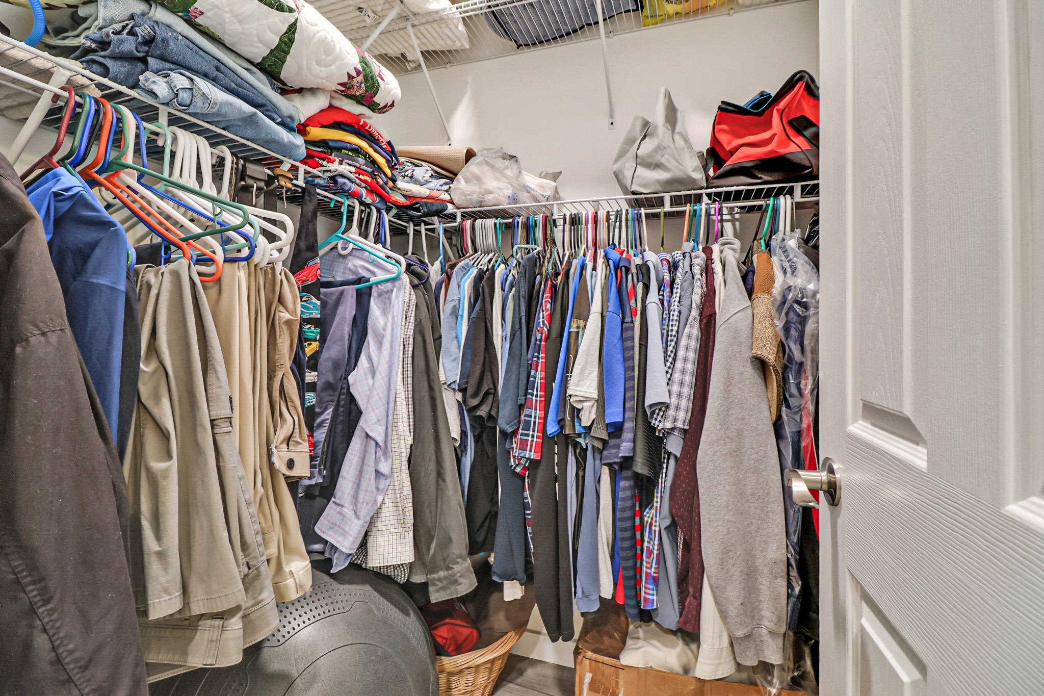 148 Porter Lane Spring City, TN 37381 - Photo 17 of 53 a view of walk in closet with clothes