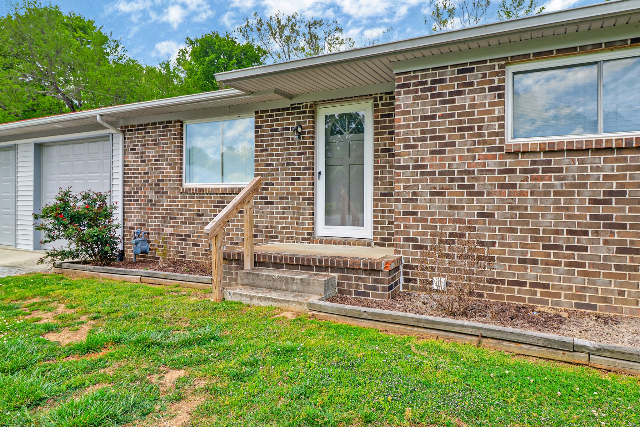148 Porter Lane Spring City, TN 37381 - Photo 23 of 53 a front view of a house with a yard