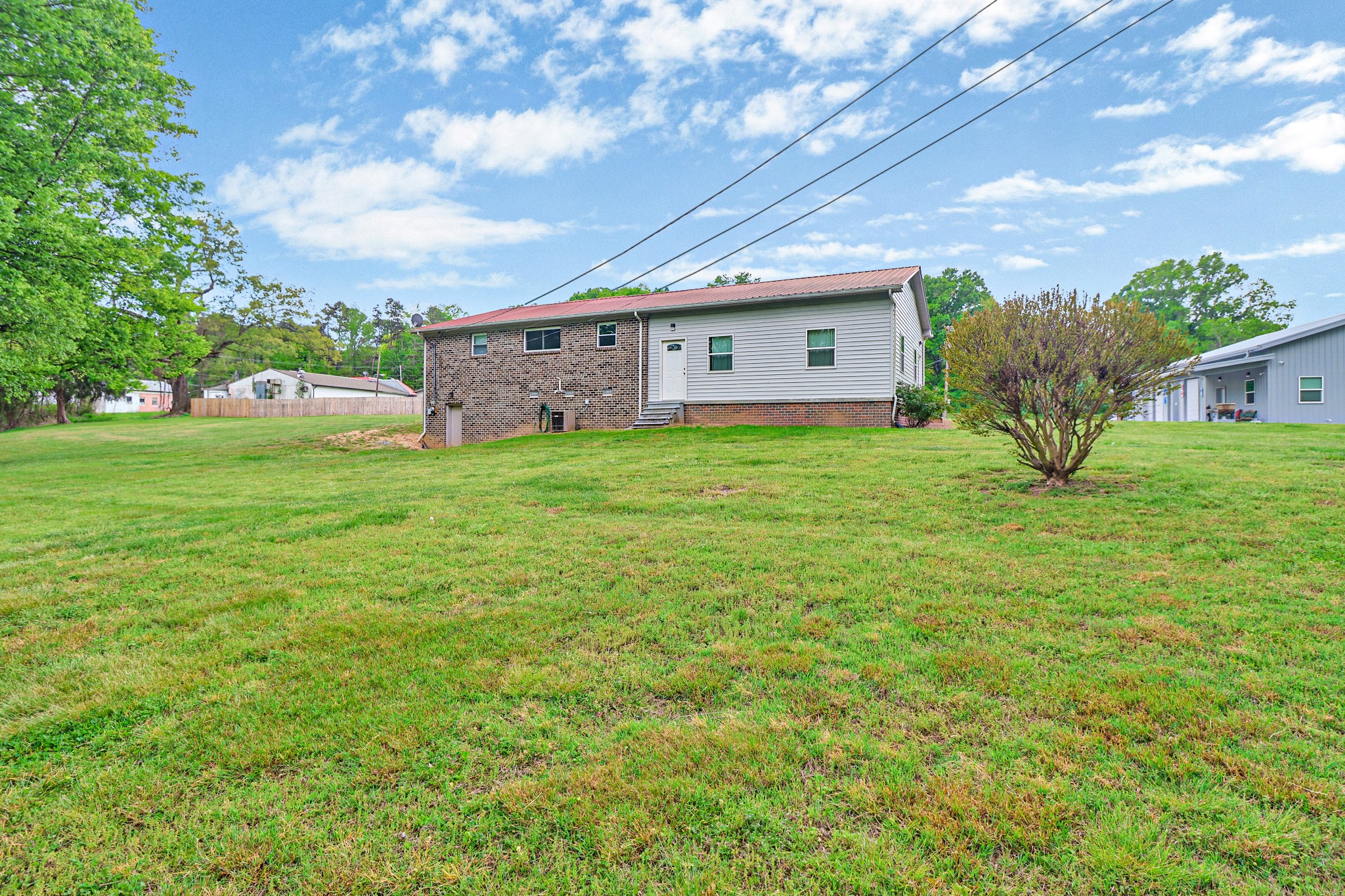 148 Porter Lane Spring City, TN 37381 - Photo 25 of 53 a house view with a garden space