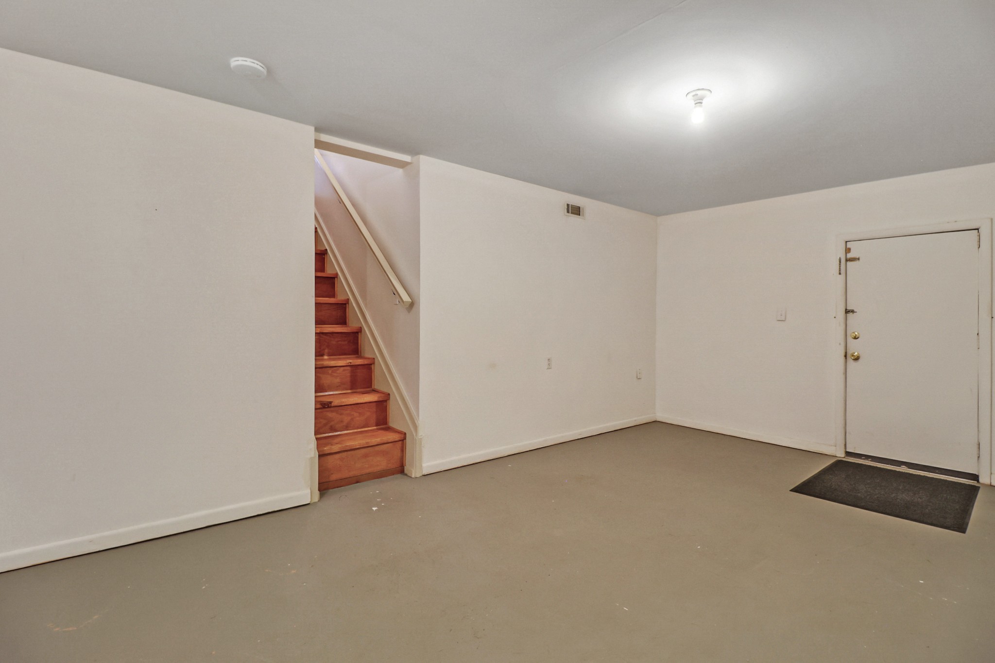 148 Porter Lane Spring City, TN 37381 - Photo 37 of 53 an empty room with staircase and white walls