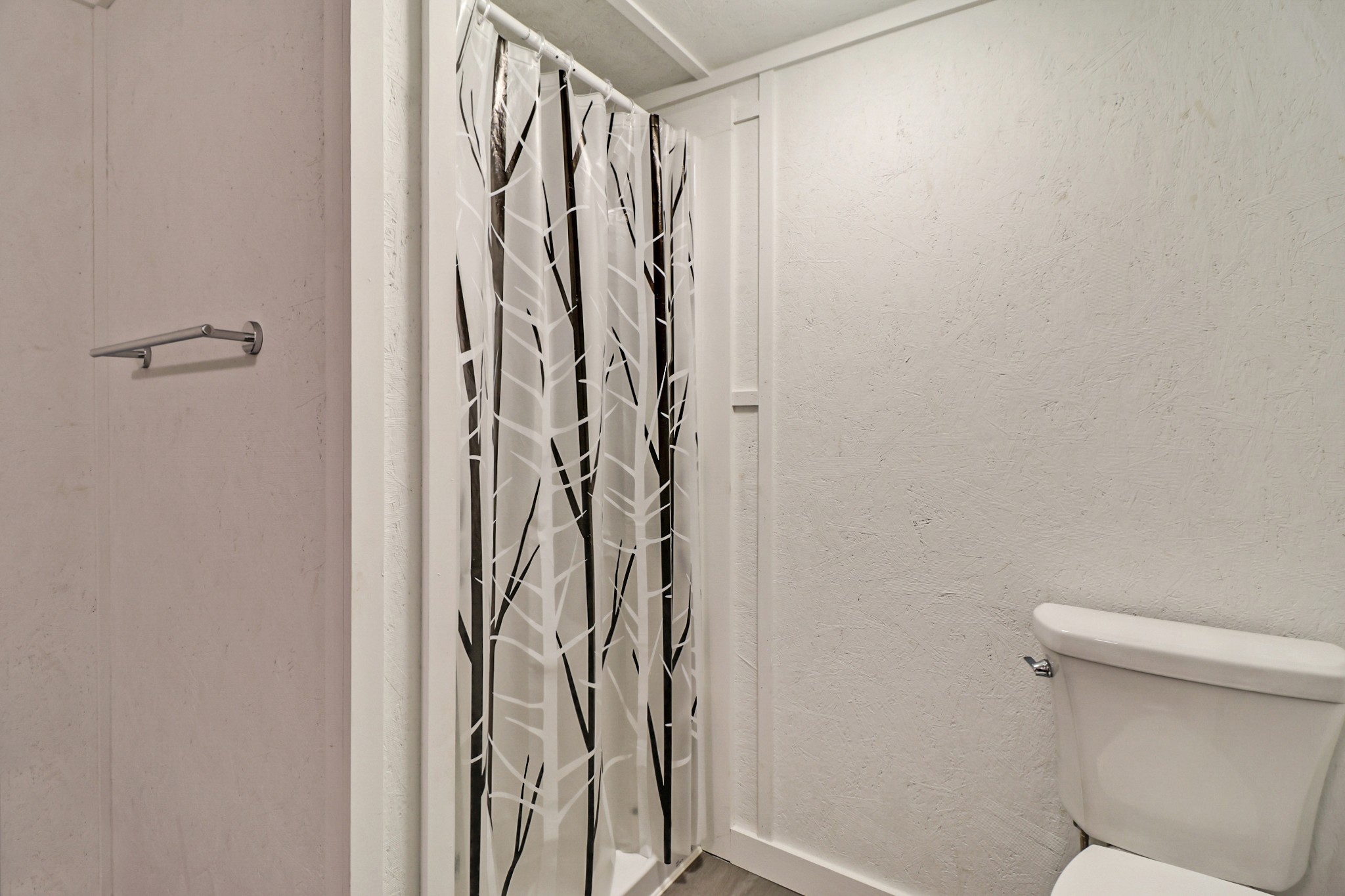148 Porter Lane Spring City, TN 37381 - Photo 39 of 53 a bathroom with a shower and a toilet