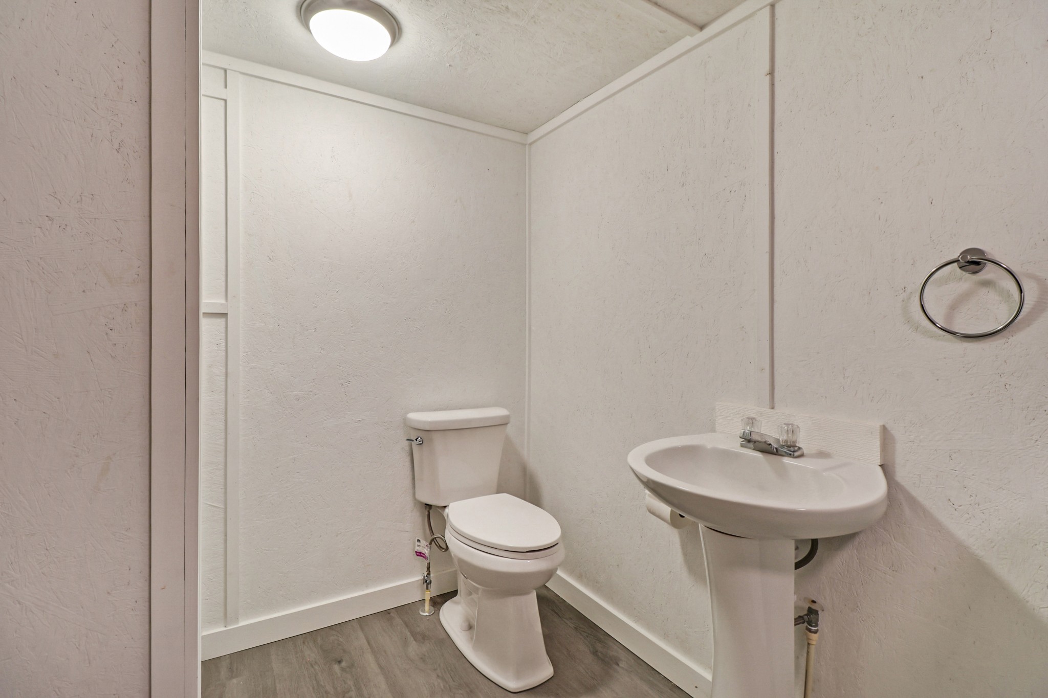 148 Porter Lane Spring City, TN 37381 - Photo 40 of 53 a bathroom with a toilet sink and mirror