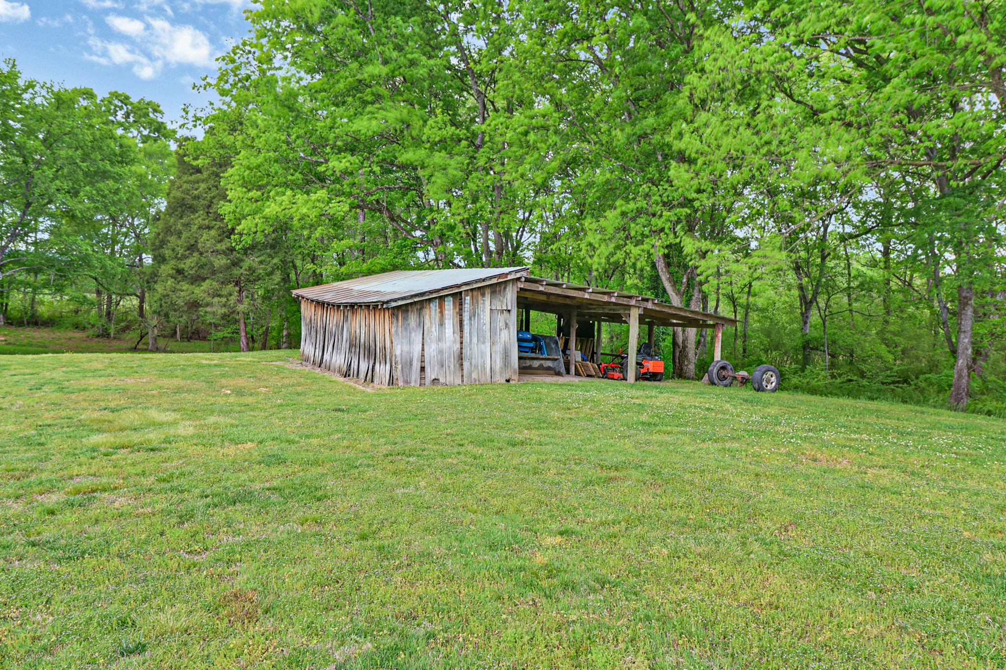 148 Porter Lane Spring City, TN 37381 - Photo 44 of 53 a view of a house with a backyard