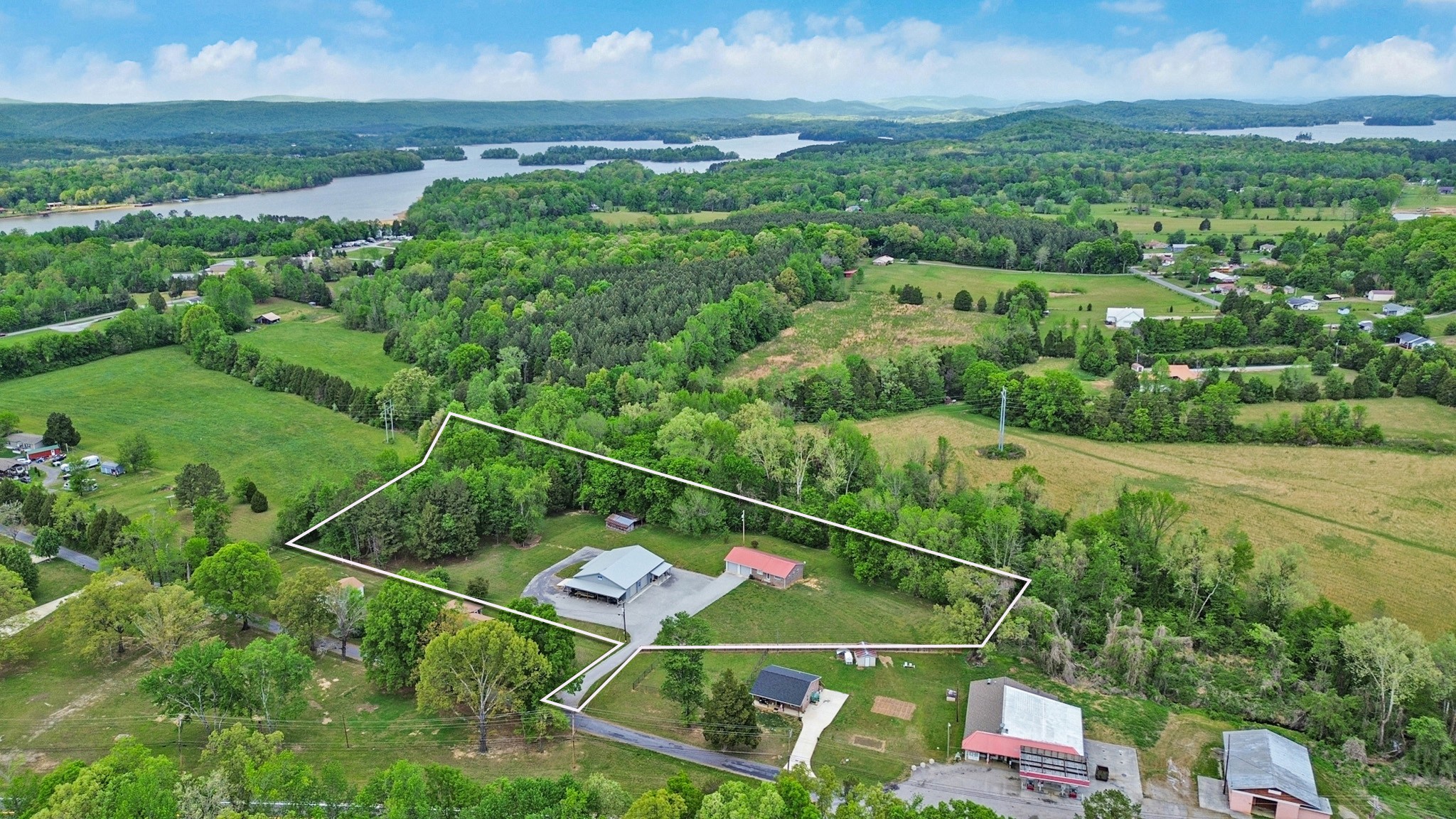 148 Porter Lane Spring City, TN 37381 - Photo 48 of 53 an aerial view of residential house with outdoor space and mountain view in back