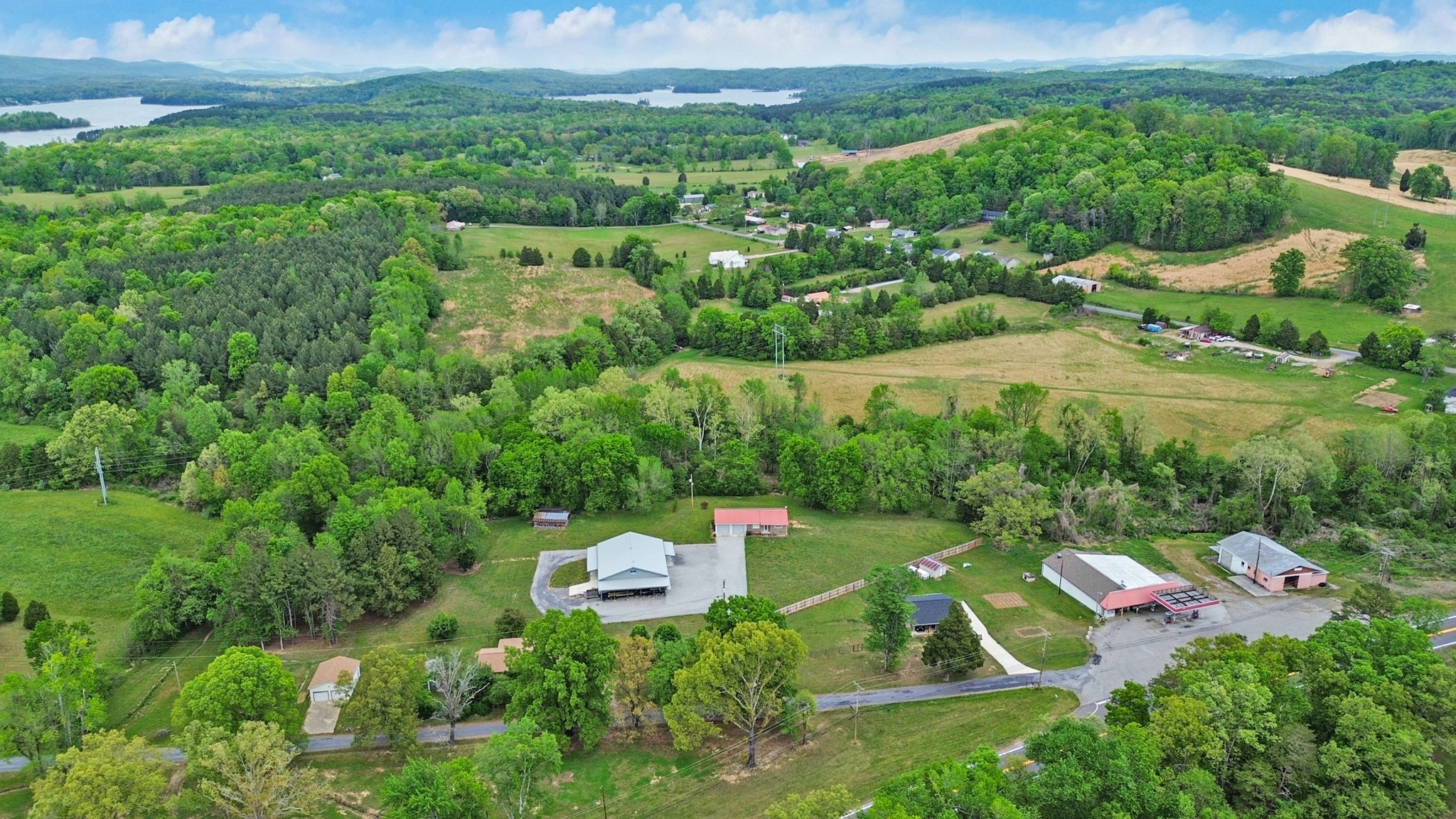148 Porter Lane Spring City, TN 37381 - Photo 50 of 53 an aerial view of a house with outdoor space and street view