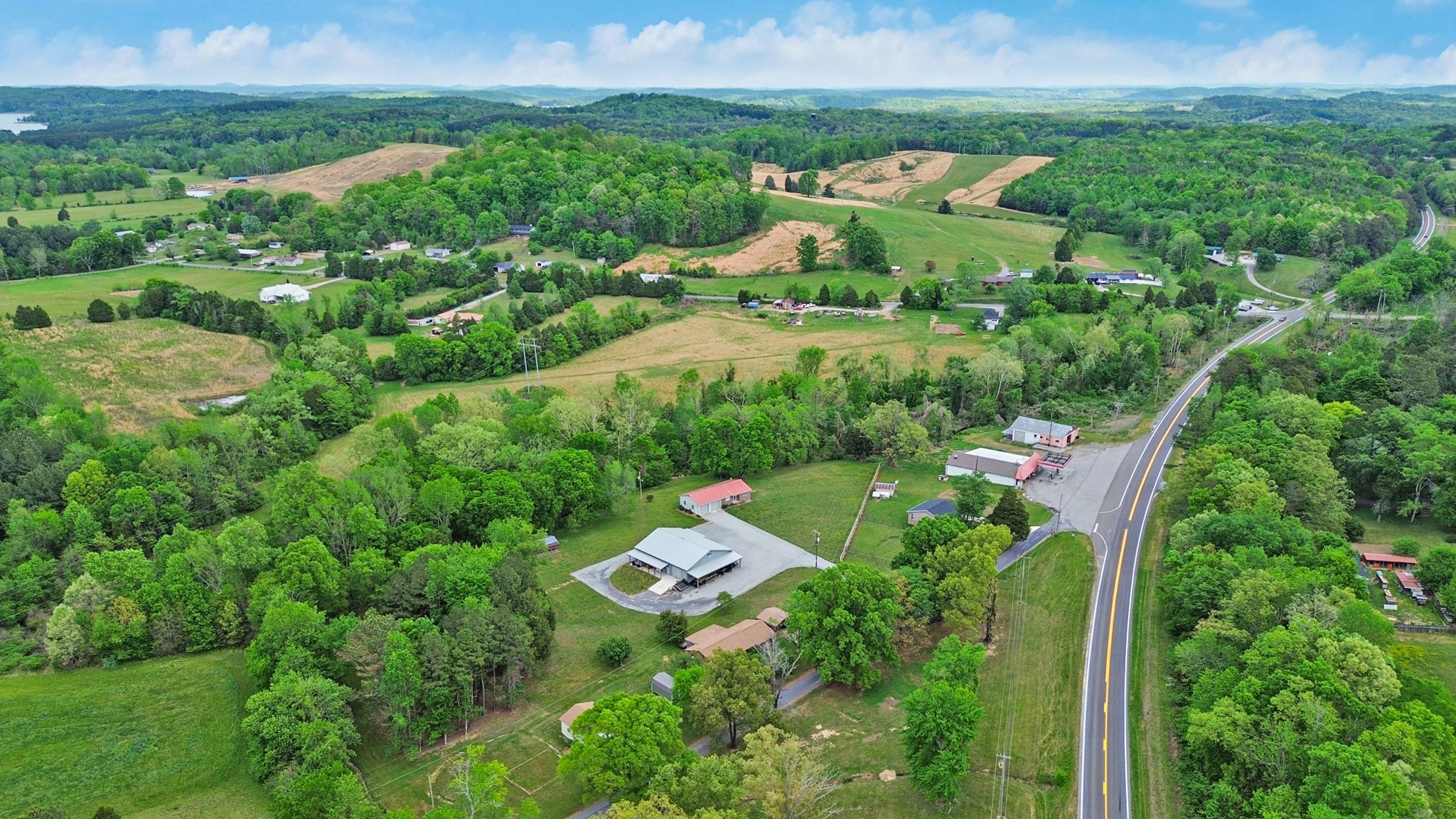 148 Porter Lane Spring City, TN 37381 - Photo 51 of 53 an aerial view of a house with outdoor space and street view