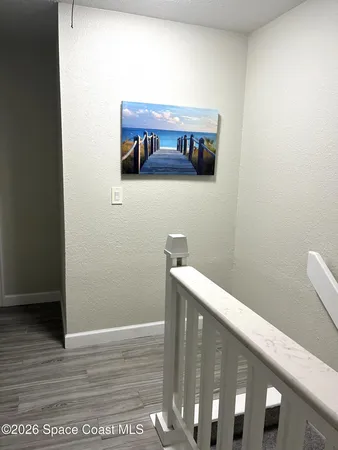a view of bathroom with wooden floor