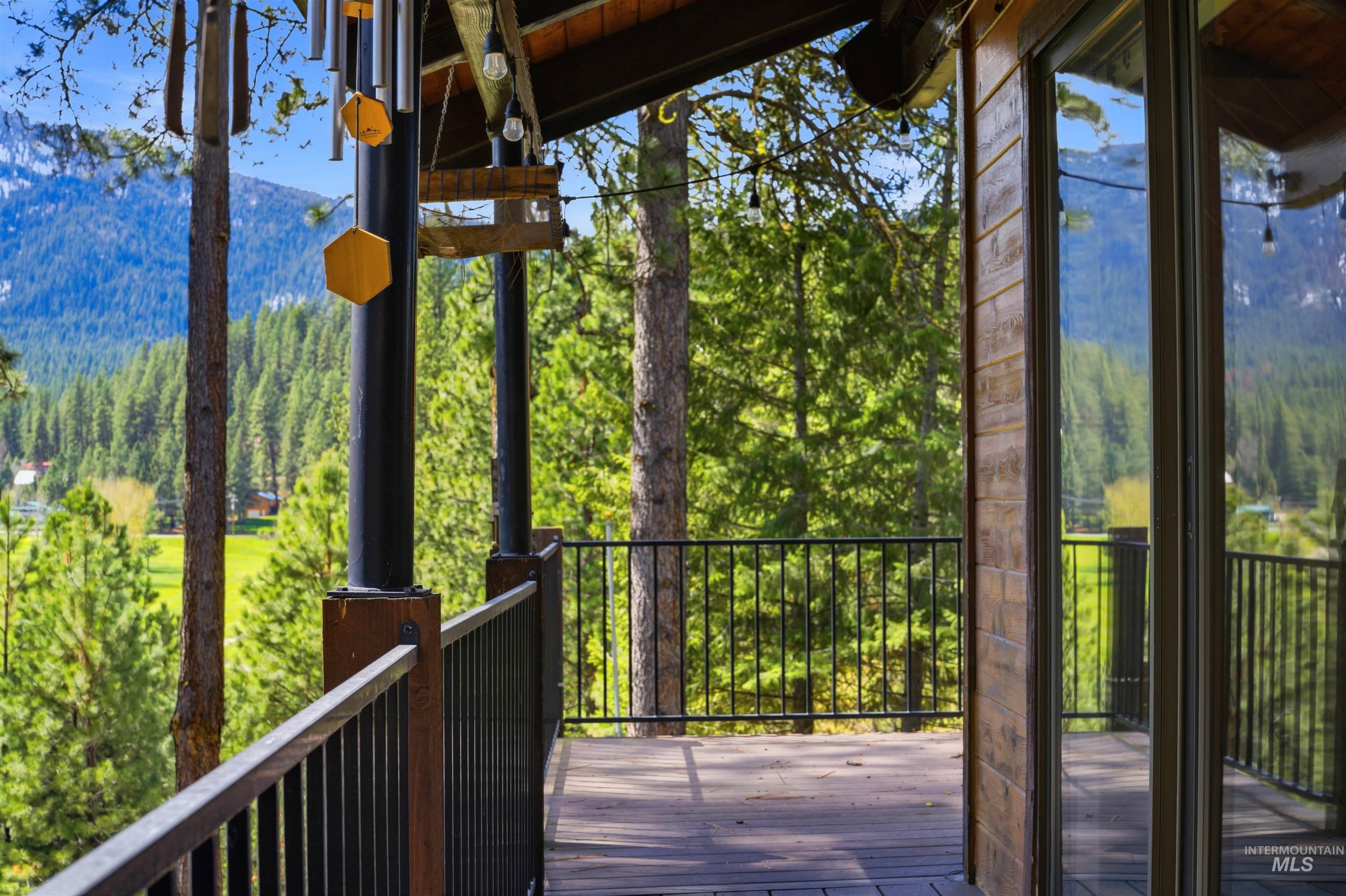 45 Rainbow Ridge Road Garden Valley, ID 83622 - Photo 13 of 41 Wooden deck with a view of trees