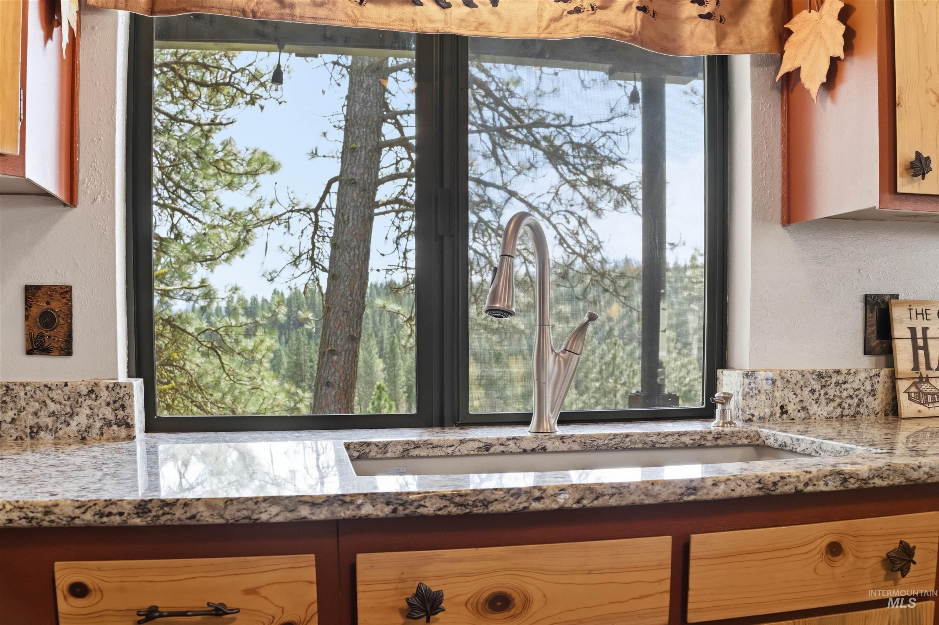 45 Rainbow Ridge Road Garden Valley, ID 83622 - Photo 40 of 41 Detailed view of a textured wall and light stone countertops