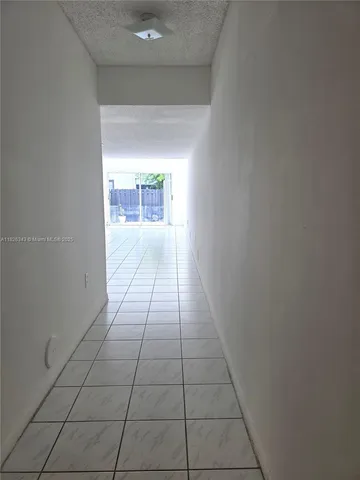 a hallway with a window