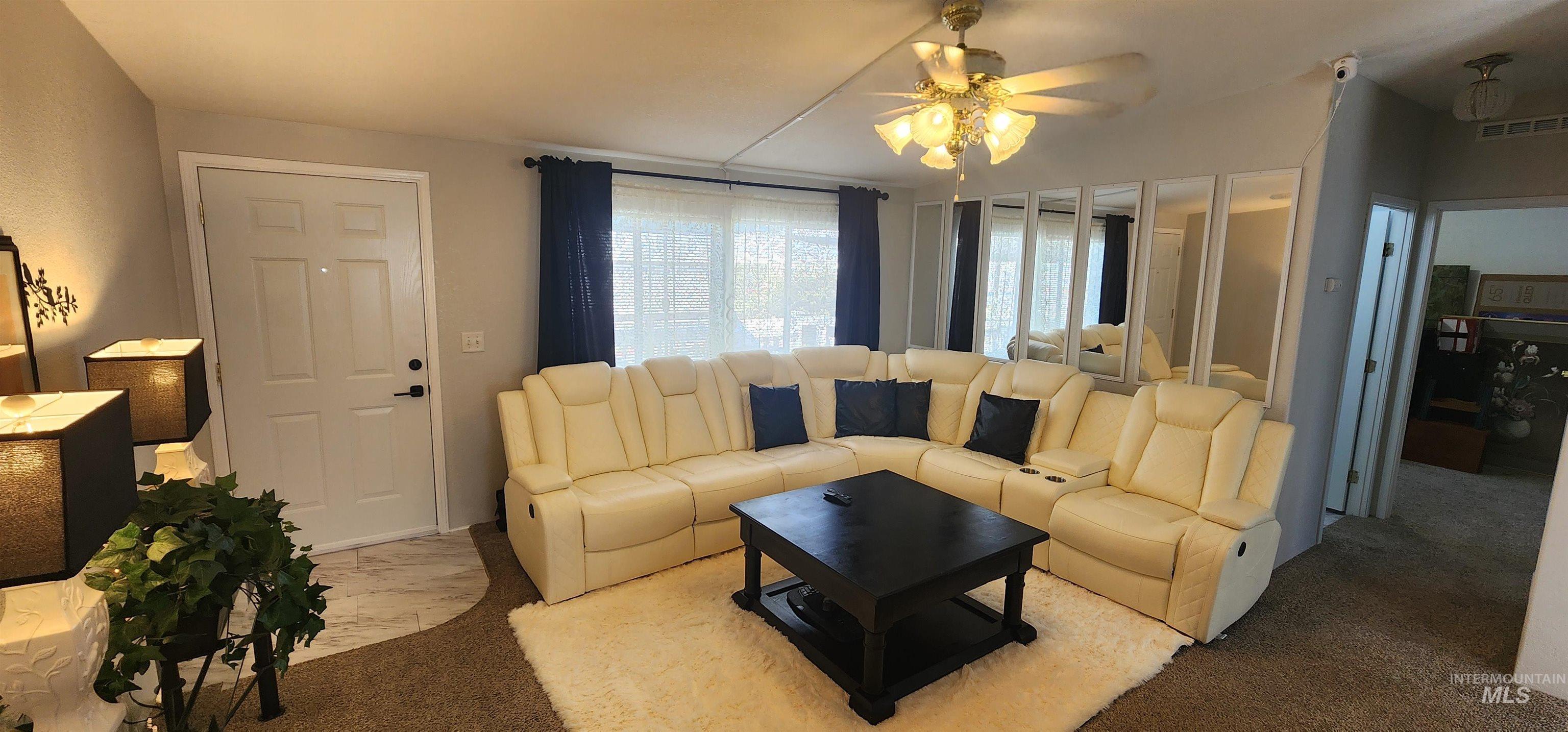 2115 6th Avenue, Unit 51 Clarkston, WA 99403 - Photo 6 of 45 Carpeted living room featuring ceiling fan