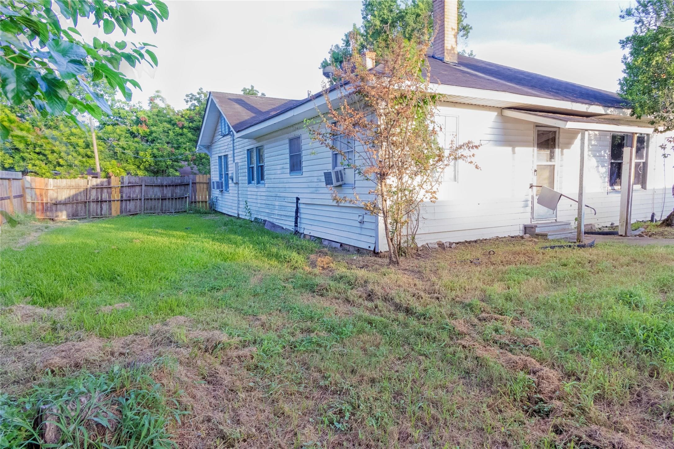 103 Birch Street Wallis, TX 77485 - Photo 11 of 11 a view of a house with a yard