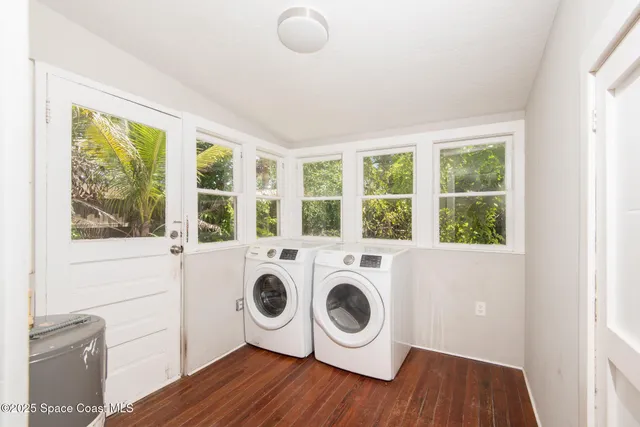 a utility room with dryer and washer