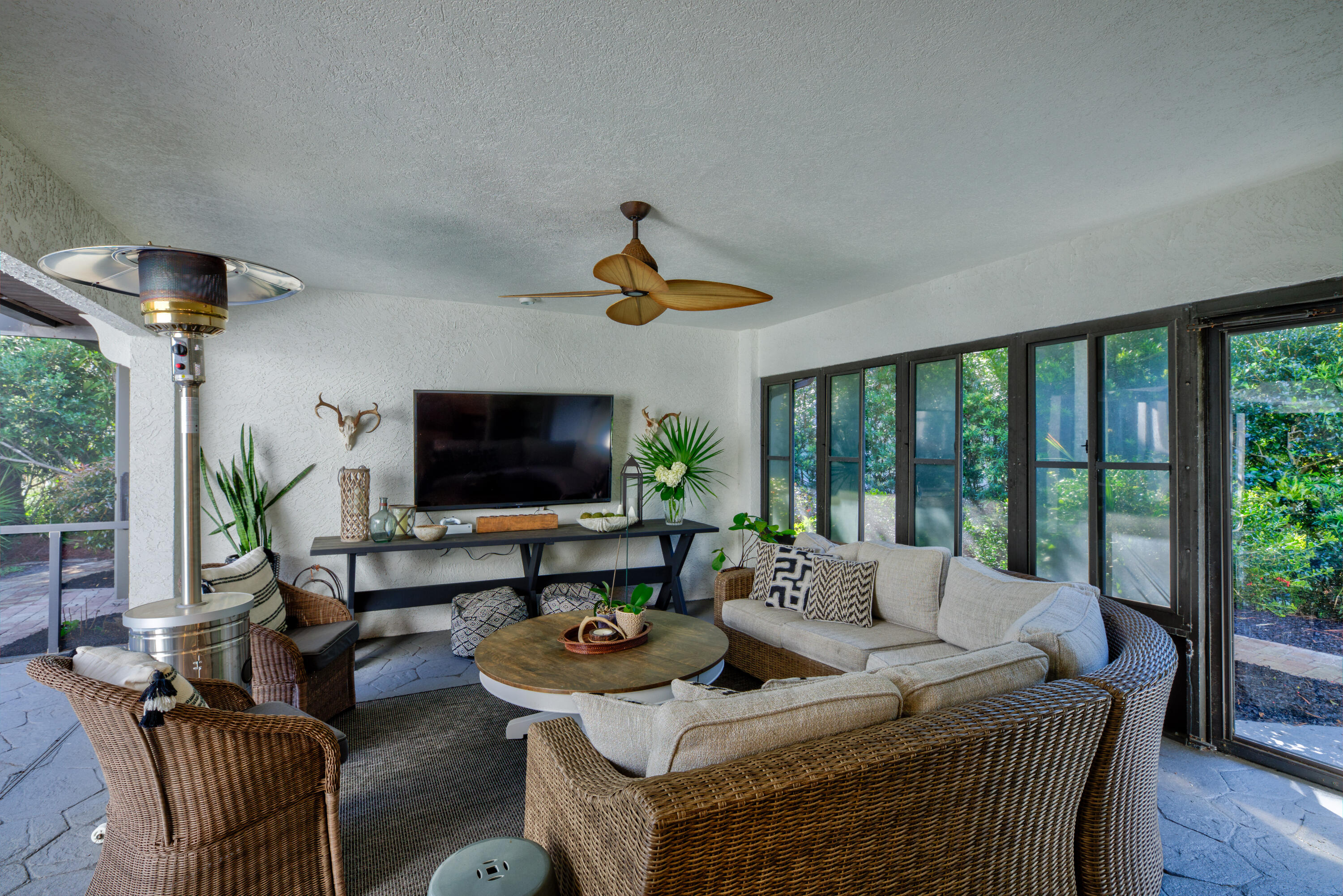 4639 Paradise Isle Destin, FL 32541 - Photo 14 of 67 a living room with furniture and a flat screen tv