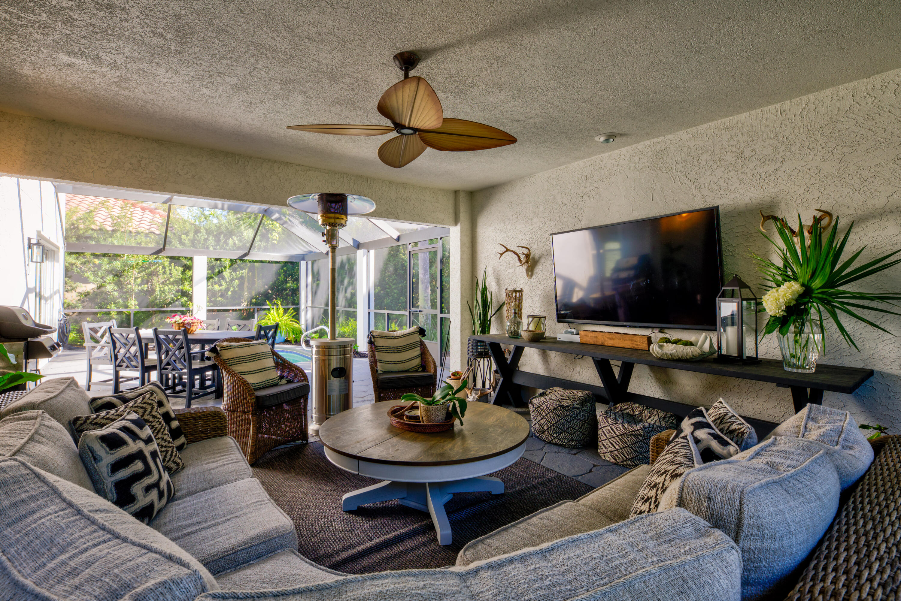 4639 Paradise Isle Destin, FL 32541 - Photo 16 of 67 a living room with furniture and a flat screen tv