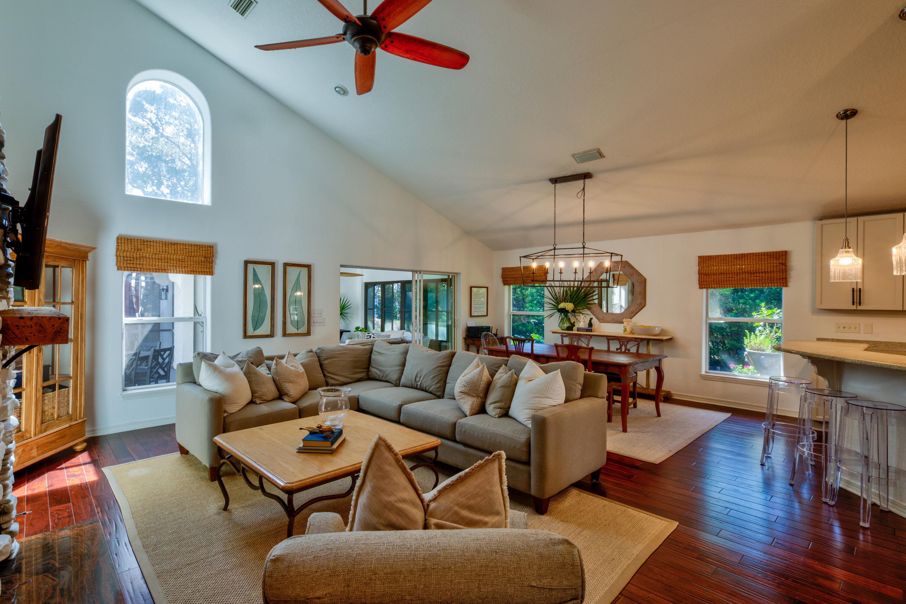 4639 Paradise Isle Destin, FL 32541 - Photo 24 of 67 a living room with furniture a dining table and a window