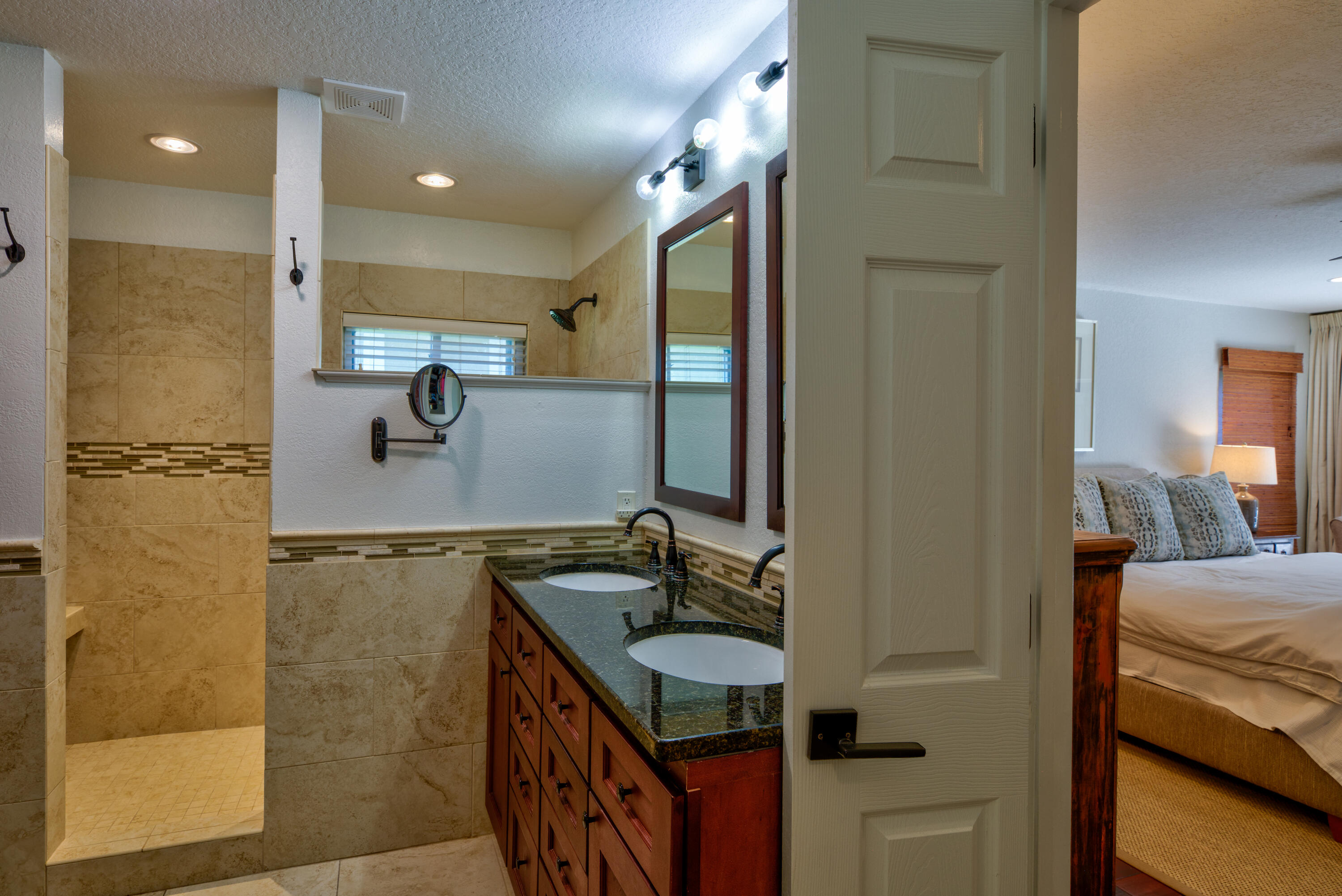 4639 Paradise Isle Destin, FL 32541 - Photo 37 of 67 a bathroom with a sink and a mirror