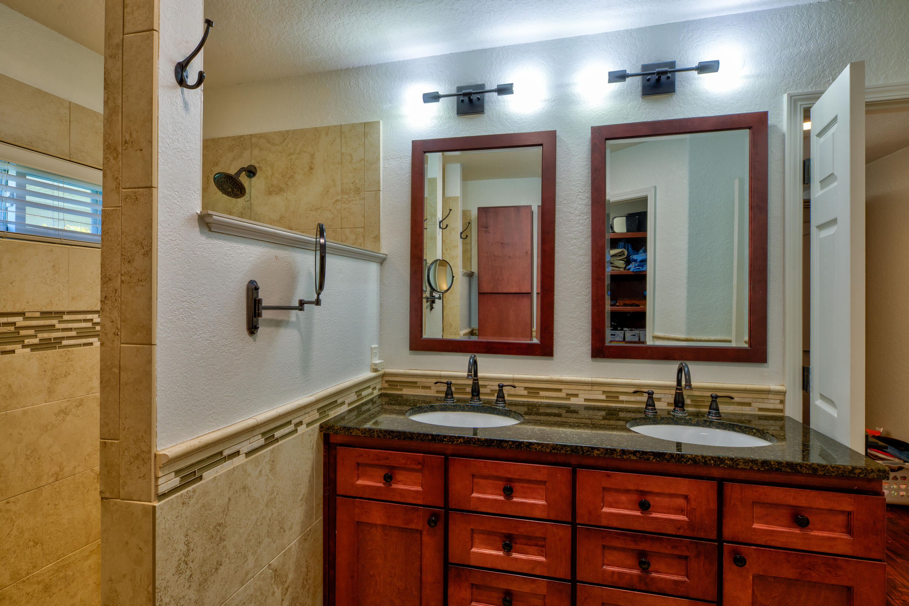 4639 Paradise Isle Destin, FL 32541 - Photo 38 of 67 a bathroom with a granite countertop sink mirror and double